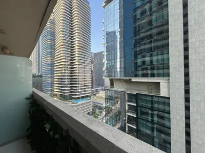a view of a city from a building balcony at Sunrise Homes A Beautiful Studio in Downtown in Dubai