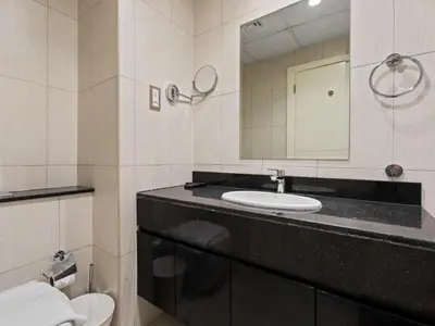 a bathroom with a sink and a mirror at Relaxing Stay Studio in Ghalia 29 in Dubai