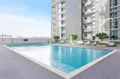 a swimming pool on the roof of a building at STAY BY LATINEM Luxury 1BR Holiday Home CV A 907 near Dubai Mall in Dubai