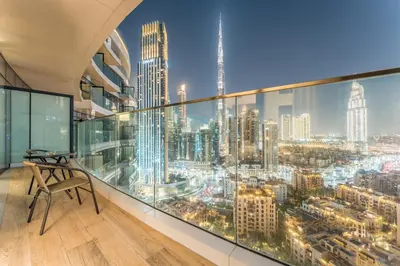 an office with a view of a city at High-Floor Balcony with Burj Khalifa View and Assistant Room, Minutes from Burj Plaza & Dubai Mall, Easy Access to Downtown Attractions, Imperial Avenue, Downtown Dubai by Deluxe Holiday Homes in Dubai