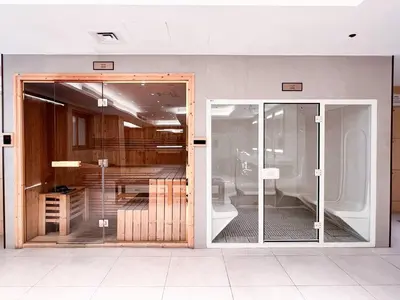 a sliding glass door in a room with a table at Elite Downtown Residence, Downtown Dubai - Onelink in Dubai
