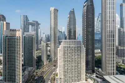 a view of a large city with tall buildings at 3Min to Dubai mall and Burj Khalifa, Luxury 1B and Amenities in Dubai
