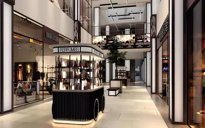 a store aisle with a display case in a mall at Studio in Dubai