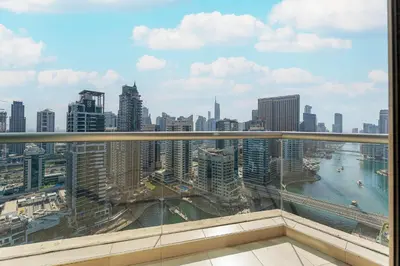a view of a city skyline from a balcony at HAVN - 2 bedroom in Marina with Dubai Marina View in Dubai