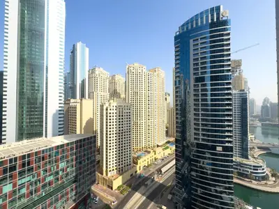 a view of a city skyline with tall buildings at Werova- Waterfront 1-Bedroom Apartment Furnished in Dubai