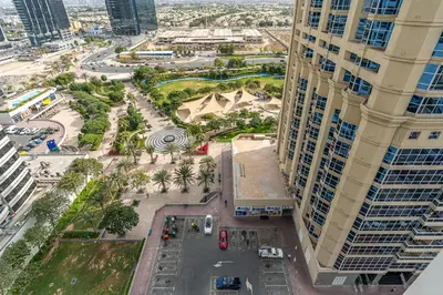 an aerial view of a city with tall buildings at Stylish JLT Studio in Dubai