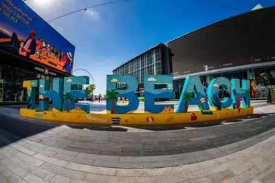 a mural of the word barcelona on the side of a building at Vacationer l Cozy 2 Bed l Breathtaking Sea and Ain Dubai Views in Dubai
