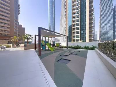 a playground in a city with tall buildings at Vacationer l Chic Upgraded Studio l City Views l Dubai Marina in Dubai