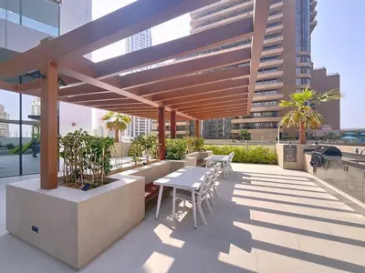 a patio with a table and chairs on a building at Vacationer l Chic Upgraded Studio l City Views l Dubai Marina in Dubai