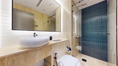 a bathroom with a sink and a shower at Vacationer l Premium 2 Bedroom l Business Bay l Prime Location in Dubai