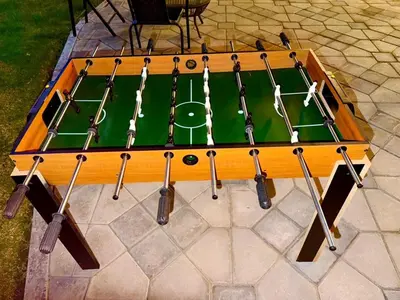 a ping pong table with at Risephoenix Japanese Luxury Capsule Villa - Dubai in Dubai