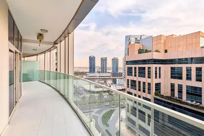 a balcony with a view of a city at Majesty Stay 2BR in Dubai