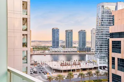 an aerial view of a city with tall buildings at Majesty Stay 2BR in Dubai