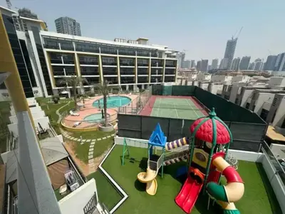 a playground on the roof of a building at Refined Urban Studio Walk to Circle Mall in Dubai