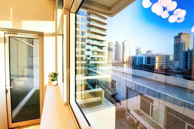 a balcony with a view of a city skyline at Barsana - Aurelia by JBR Beach - 2 Bed - Marina Views! in Dubai