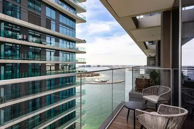a view from the balcony of a building at Beachfront 1BR Retreat Beach Isle Tower 01 in Dubai