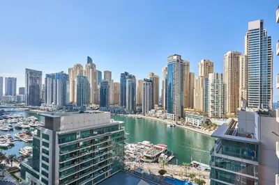 a view of a city with a river and buildings at Frank Porter - Al Majara, Dubai Marina in Dubai