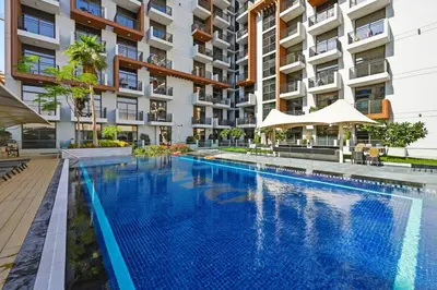 an image of a swimming pool in front of a building at Bloomfields Stunning STU, Elz By Danube, Dubai in Dubai