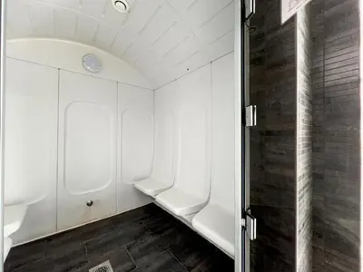 a bathroom with white cabinets and a door at Settler Homes - Premium Matrix Tower with Hot Tub in Dubai