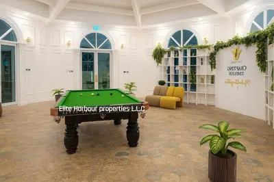 a billiard room with a pool table in it at Luxury Apartment in Vincitore Benessere, Dubai in Dubai