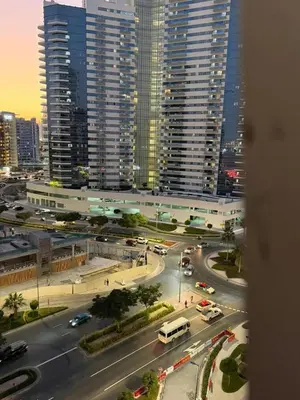 a view of a city street with cars and buildings at Modren Private Partition Room In Barsha Heights Tecom in Dubai