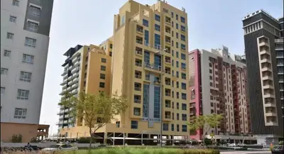 a tall building in a city with tall buildings at Modren Private Partition Room In Barsha Heights Tecom in Dubai