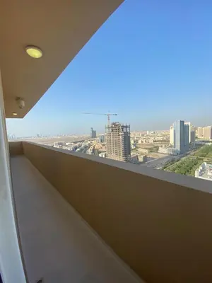 a view of a city from a building balcony at Ghalia in Dubai