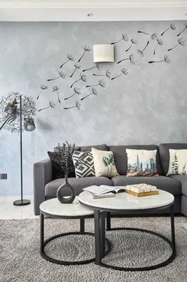 a living room with a couch and a table at Frank Porter - Opal Tower in Dubai