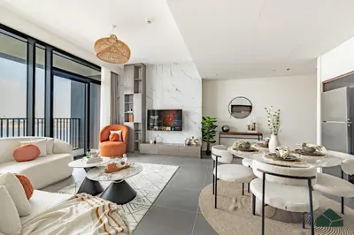a living room with a couch and a table at Serene 2BR with Sea View by BMS in Dubai
