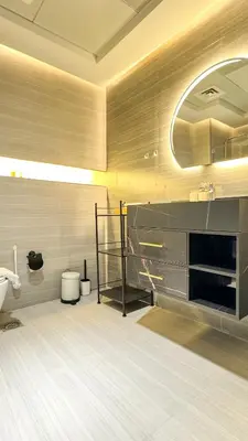 a bathroom with a sink and a toilet in a room at Stylish 1BDR Centrally Located for 4 Persons in Dubai