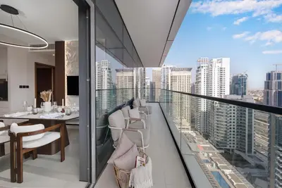 a dining room with a view of the city at VIDA Marina Best Location NEW in Dubai