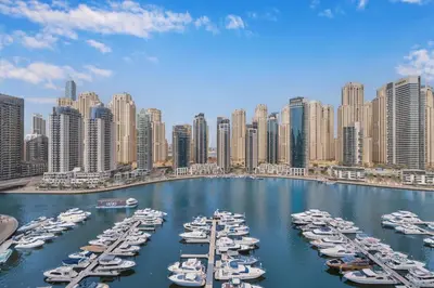 a group of boats docked in a harbor in a city at VIDA Marina Best Location NEW in Dubai
