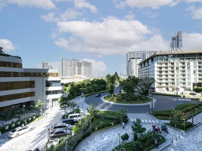 an aerial view of a city with buildings at Luxury 1BR Featuring Guest - Study Room-SOBHA Waves in Dubai