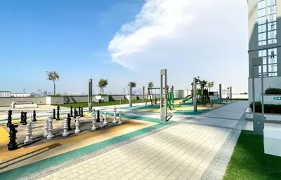 a playground on the roof of a building at Luxury 1BR Featuring Guest - Study Room-SOBHA Waves in Dubai