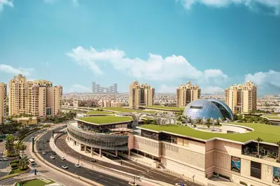 a view of a city with buildings and roads at Seven Palm! Rooftop Infinity Pool with Great View! Private Beach Access! in Dubai