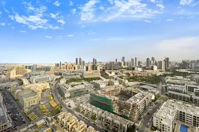 an aerial view of a city with tall buildings at Golden Stays - Chic 1BR Oasis Serene & Private in Dubai