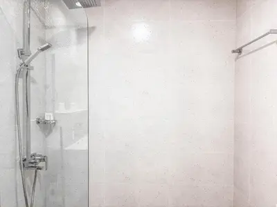a shower with a glass door in a bathroom at Jewelz by Danube, Arjan, Al Barsha - Onelink in Dubai