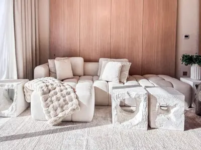 a living room with a white couch and tables at Jewelz by Danube, Arjan, Al Barsha - Onelink in Dubai