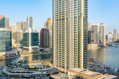 a view of a city with tall buildings and a river at GuestReady - 1BR Luxury | Prime City Area in Dubai