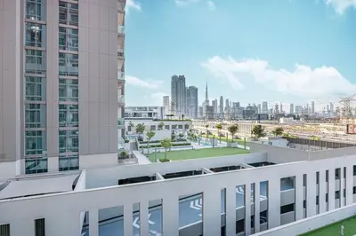 a view of the city from the balcony of a building at Burj Khalifa & Downtown Skyline View Apartment in Dubai