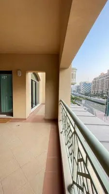 a balcony with a view of a building at Luxury 1-Bedroom, Golden Mile Palm Jumeirah in Dubai