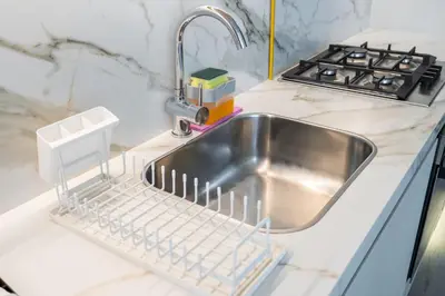 a kitchen sink with a faucet next to a sink at Luxury Studio at Marina Star - Near JBR - Marina in Dubai