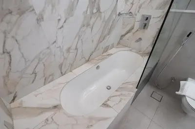 a bathroom with a white sink and a toilet at Luxury Studio at Marina Star - Near JBR - Marina in Dubai