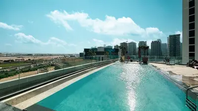 a swimming pool on the top of a building at 2 bedroom in heart of Business Bay - Dubai in Dubai