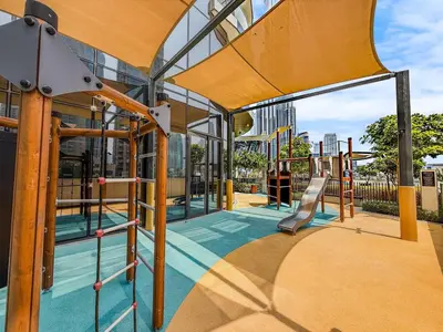 an empty playground with a slide in a building at Ultra-luxury apartment |Stunning Burj Khalifa view in Dubai