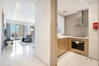 a kitchen and living room with a view at 2 bedroom in heart of Business Bay - Dubai in Dubai