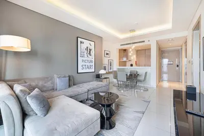 a living room with a couch and a table at 2 bedroom in heart of Business Bay - Dubai in Dubai