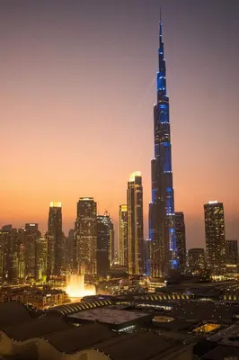 a view of a city skyline with a tall skyscraper at 2BR Vida Dubai Mall Burj Khalifa & Fountain View in Dubai