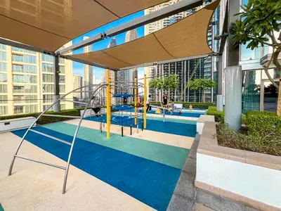 a playground in the middle of a building at Burj Crown 3BR Skyline Retreat with Balcony in Dubai