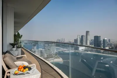 a balcony of a building with a view of a city at Ultimate Beachfront family home with panoram views! in Dubai